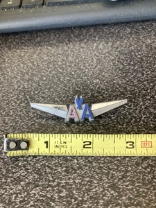 VINTAGE AMERICAN AIRLINES PLASTIC SILVER LOGO PIN - Picture 1 of 2