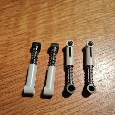 4x LEGO TECHNIC 6027565 - 76537 Shock Absorbers Hard Medium Stone Grey/Black - Image 1 of 3