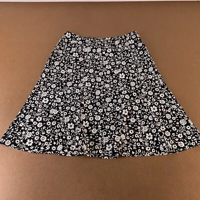 Falda midi Christopher & Banks para mujer talla 12 negra blanca con estampado floral acampanada con dobladillo Foto 1 de 4