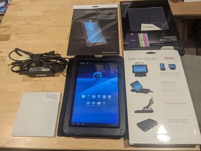 Toshiba Thrive AT100 bundle with tablet, 3 batteries, 2 cases, charger & more - Image 1 of 4