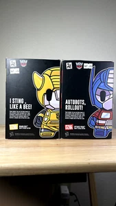 Transformers DZNR Set Optimus Prime & Bumblebee Plüsch - What’s Inside Edition - Bild 1 von 6