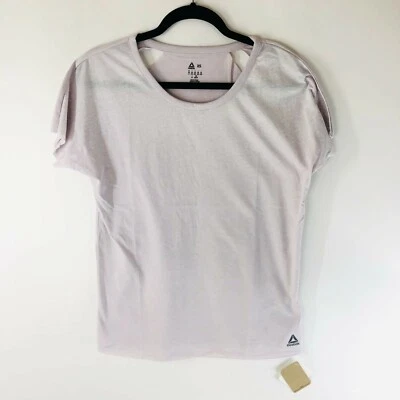 Camiseta Reebok Mujer Desgastada Top Recortes Gran Tamaño Rosa Claro Talla XS Foto 1 de 4