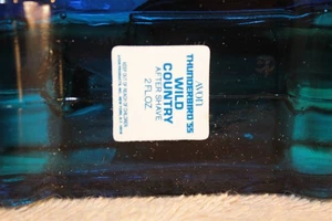 AVON DECANTER THUNDERBIRD '55 WILD COUNTRY AFTER SHAVE 2 OUNCE FILLED WITH BOX - Picture 1 of 2