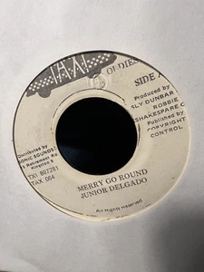 Junior Delgado  "merry go round"  7"  - Vinyl Record (VG) - Picture 1 of 2
