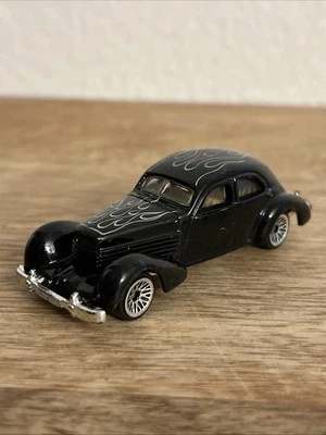 Hot Wheels 1936 '36 cable negro con llamas plateadas HW Pride Rides serie 2004 juguete Foto 1 de 4