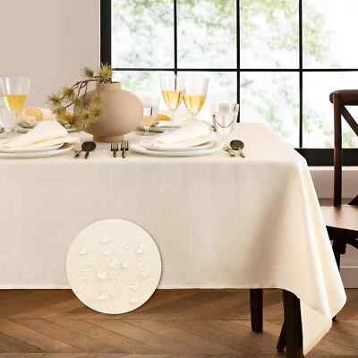 New Laurel Solid Texture Water Stain Resistant Tablecloth 60"X120" Oblong Ivory - Image 1 of 4