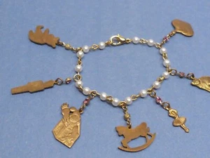 (B5) Bracciale Charm Cristallo Rosa e Perle Finte - Ballerina, Orso, Altro - Piccolo - Foto 1 di 7