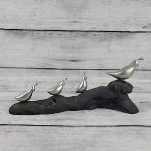 Escultura de pisapapeles de peltre plateado sobre roca negra firmada - Imagen 1 de 7