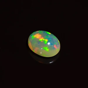 2.5 Ct Ethiopian Opal Gemstone 10x8x5 mm Oval Cabochon Multi-Color Fire Play - Picture 1 of 3