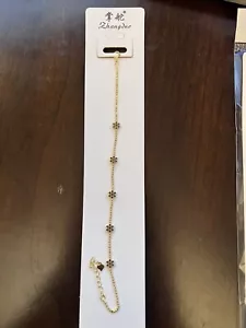 Pulsera Zhangduo dorada con diseño de copo de nieve negro - Imagen 1 de 1
