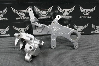 Honda CR125R CRF250R 2005 OEM pinza de freno trasera y soporte 43150-KRN-711 Foto 1 de 4