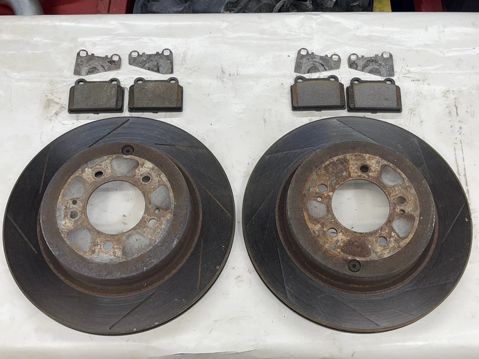 08-15 Evolution X Evo 10 Used Brembo Rear Slotted Rotors with Pads 2008-2015 - Image 1 of 4