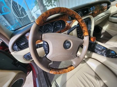2004 2005 2006 2007 2008 2009 JAGUAR XJ8 VANDEN PLAS LEFT DRIVER STEERING WHEEL - Image 1 of 3