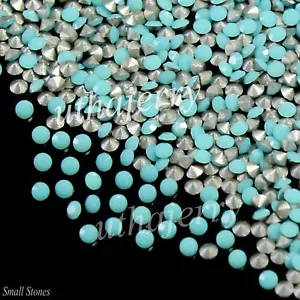 100 Pezzi Ingrosso Naturale Arizona Blu Turchese Argento Rivestito 0,70 MM Gemme Rotonde - Foto 1 di 6