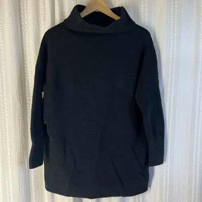 Suéter otomano Free People holgado acanalado cuello falso túnica pequeño negro de gran tamaño Foto 1 de 4