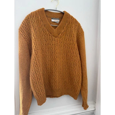 Jersey de punto de lana amarillo Foto 1 de 4