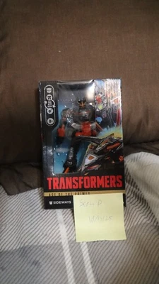 Transformers Age Of The Primes serie Deluxe Class Sideways sellado Foto 1 de 2