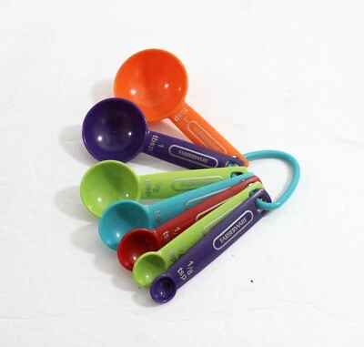 Colorful Farberware Measuring Spoons Set (7) on Turquoise Ring - Image 1 of 3