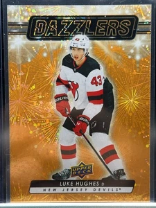 Serie extendida de cubierta superior Luke Hughes Dazzlers naranja #DZ-124 Devils 2023-24 - Imagen 1 de 2