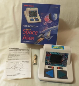 Radio Shack LCD Space Alien Handheld Game Vintage In Box w Manual 1990 Tandy - Picture 1 of 6