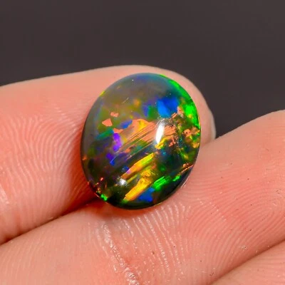 Peine de miel de 3,5 quilates ópalo de fuego negro ópalo etíope forma ovalada piedra preciosa 13X11X4 mm Foto 1 de 4