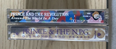 1985/91-TWO PRINCE CASSETTES, " DIAMONDS AND PEARLS/AROUND THE WORLD IN A DAY" Foto 1 de 4