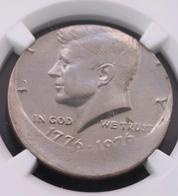 1776-1976 50C Kennedy Half Dollar NGC MS 62 Struck 15% Off Center - Image 1 of 4