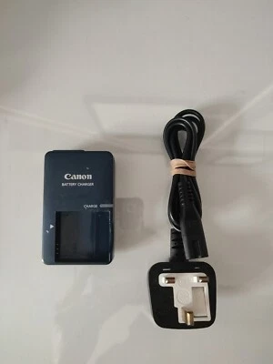 Cargador de batería Canon CB-2LVE G + cable de alimentación del Reino Unido para NB-41 - probado Foto 1 de 2