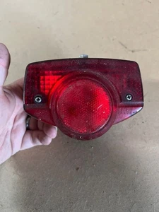 HONDA C90/CB175/200/400/500/CB750 REAR TAIL LIGHT UNIT COMPLETE WORKING. - Picture 1 of 7