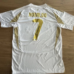 Cristiano Ronaldo Signed Al-Nassr Home Adidas Jersey w/COA Holo Size L w/tags - Picture 1 of 5