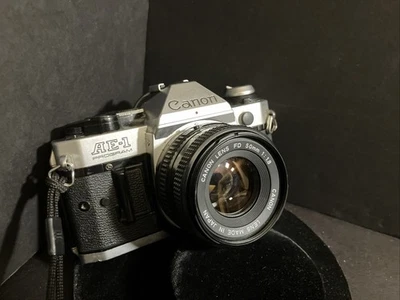 Cámara fotográfica Canon AE-1 Program 35 mm con lente 50-1,8 película probada batería nueva Foto 1 de 4