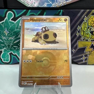 Hippopotas 052/131 Prismatic Evolutions Poke Ball Holo NM - Picture 1 of 2