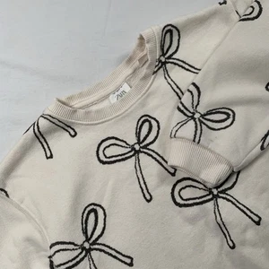 Zara Girls Ivory with Black Bow Long Sleeve Fleece Pullover Sweatshirt Size 4-5 - Picture 1 of 7