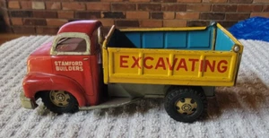 Vintage LINE MAR Stamford Builders GMC Litho Hauling Dumping Truck Metal Tin Toy - Picture 1 of 9