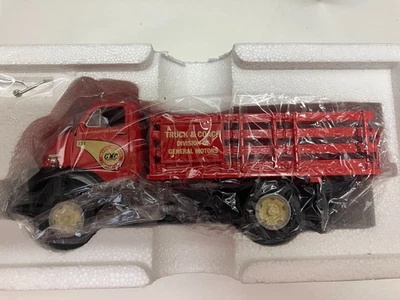 Camión de estacas GMC First Gear 1952 camión y autocar GMC 10-1253 1/34 Foto 1 de 3