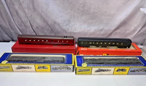 Four HO Train Cars 2-Rivarossi and 2-AHM  JA73 - Picture 1 of 7