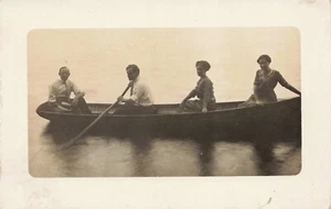 Two Men & Two Women Out on a Row Boat RPPC 1904-1918 - Picture 1 of 2