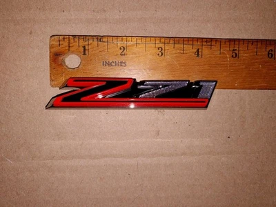  EMBLEMA PARRILLA DELANTERA CHEVROLET SILVERADO 1500 OEM Foto 1 de 4