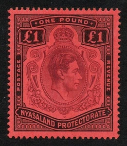 1938-44 Nyasaland KGVI £1 Purple & Black/Red SG143 LMM (DE051) - Picture 1 of 2