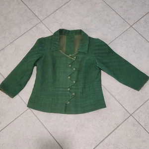 Si tratta di una giacca o blazer tuta verde vintage anni 60 da donna - Foto 1 di 11
