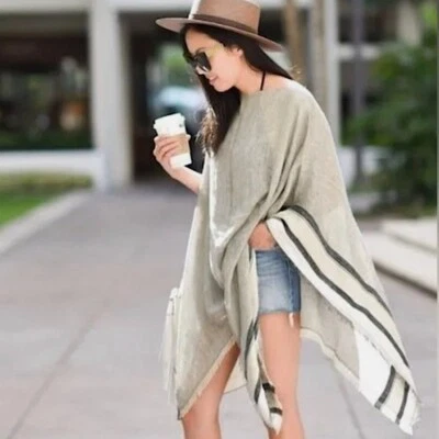 Poncho a rayas con borde de trapo y hueso mezcla de lino OS Foto 1 de 4