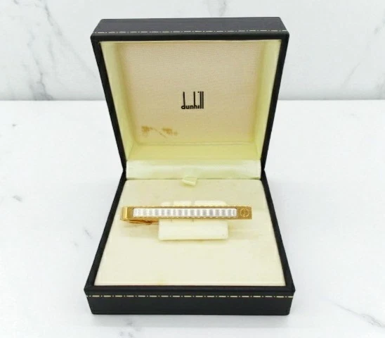 Clip de corbata Dunhill logotipo tono dorado plateado con caja usado Foto 1 de 4