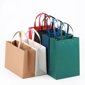 100x Remache Bolsas de compras de papel medio Euro Tote Bolsa de regalos de cumpleaños de boda - Imagen 1 de 8
