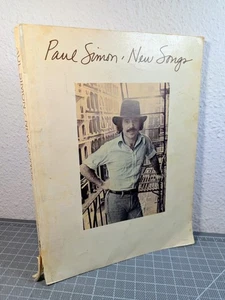 PAUL SIMON -NEUE LIEDER-LIEDERBUCH-1975 TABULATUR- 31 LIEDER-Musikheft-70er Jahre - Bild 1 von 12