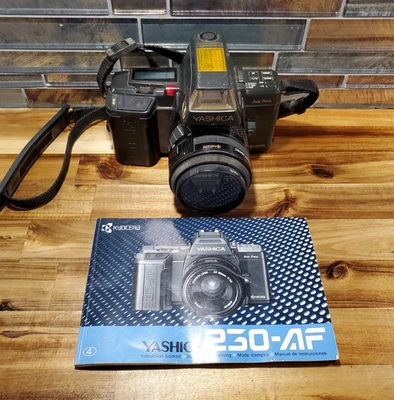 Yashica 230-AF 35mm SLR Camera with 35-70mm Lens w/ Booklet & Flash - Image 1 of 4