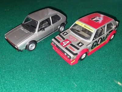 Lotto Volkswagen Golf  serie GTI hachette  1/24 e Golf Rally Burago 1/24 - Immagine 1 di 4