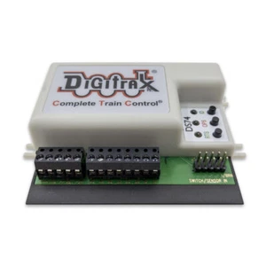 Digitrax DS74 Quad Switch Decoder Stazionario - Foto 1 di 1