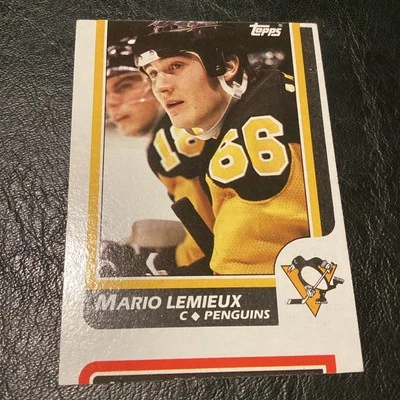 Oddball 1986-87 Topps Hockey #122 Mario Lemieux w/ Guy Charbonneau Penguins Card - Image 1 of 4
