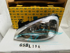 Faro anteriore proiettore sx Opel Corsa C 9/00 1EH008684011 con tenuta rotta - Picture 1 of 5
