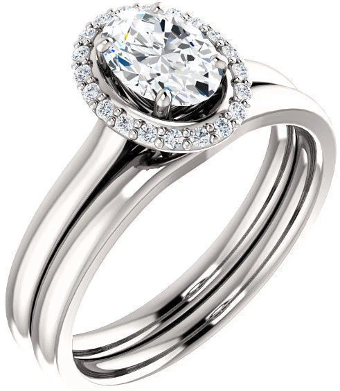 Boda de compromiso de oro blanco de 14 k con halo de diamantes ovalados y redondos en total de 1,12 quilates Foto 1 de 1